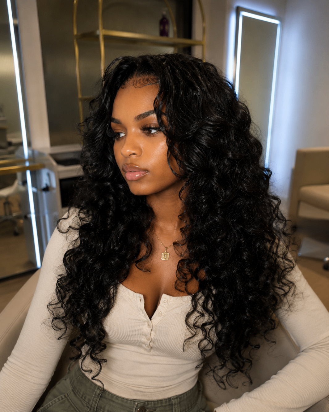 Defined curls styled with a soft side sweep